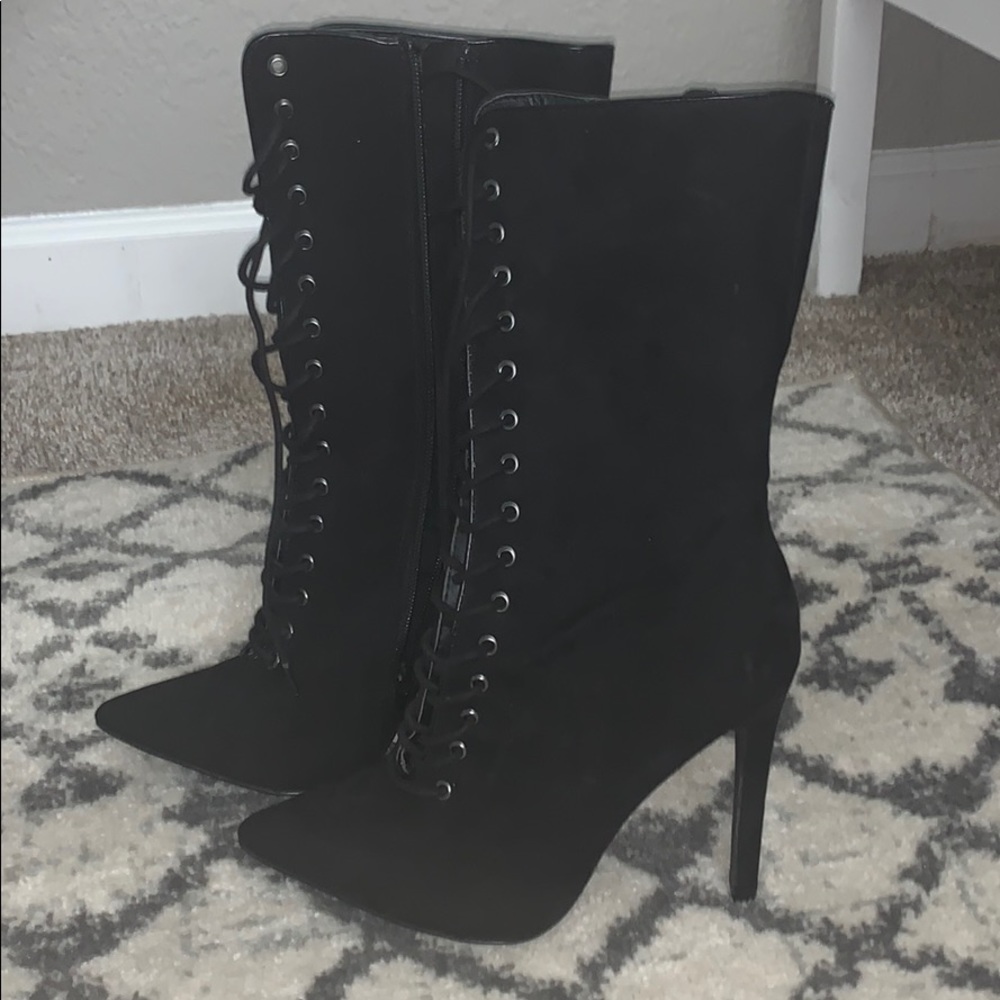 Lace up high heel boots